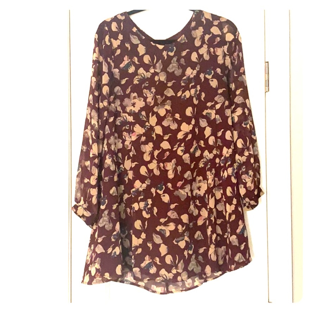 Adorable fall flowy dress. Great with boots!